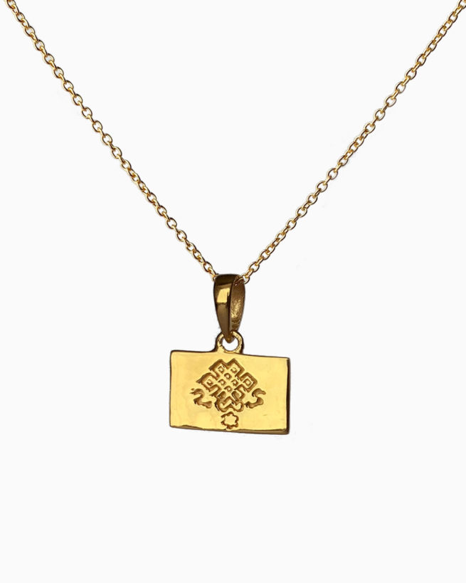gold plated endless knot necklace by veda jewelry
