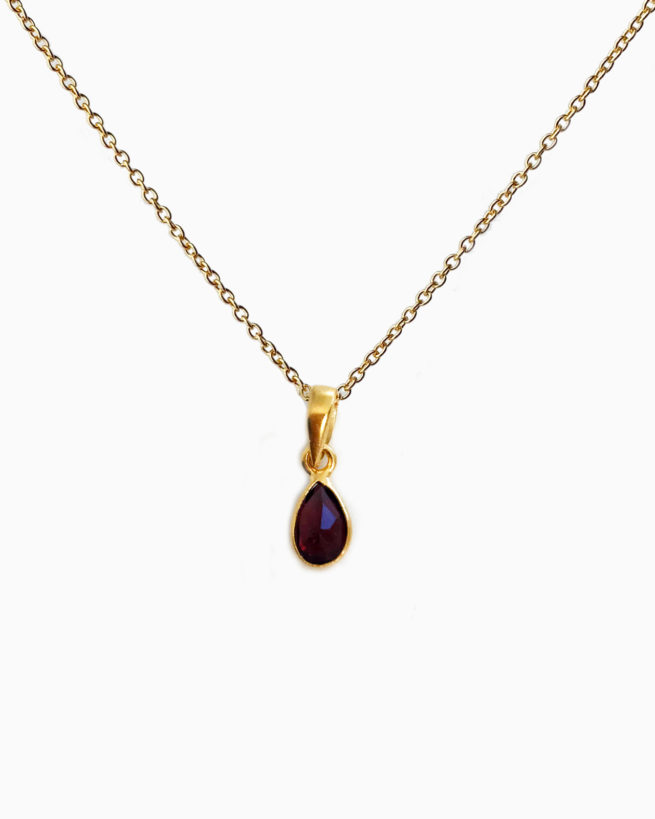 small gold plated garnet pendant necklace by veda jewelry