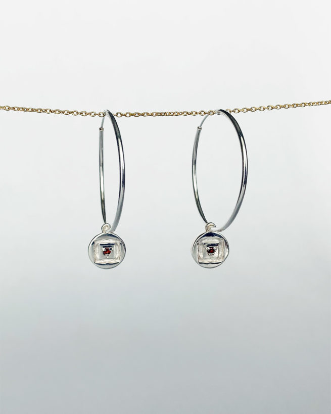 silver root chakra hoop earrings by veda