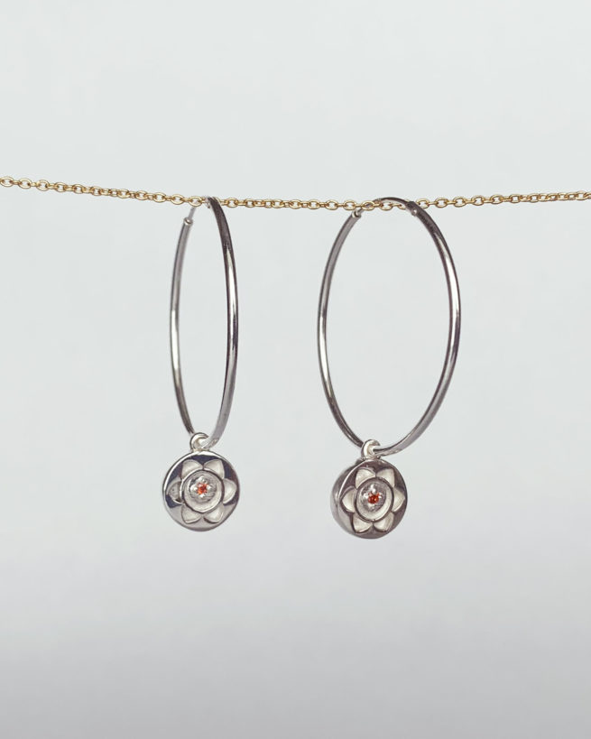 silver sacral chakra hoop earrings by veda